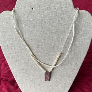 Elegant Pearl and Silver Pendant Necklace